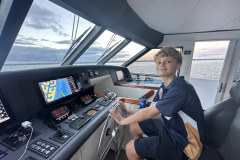 Son-Luke-at-the-Helm